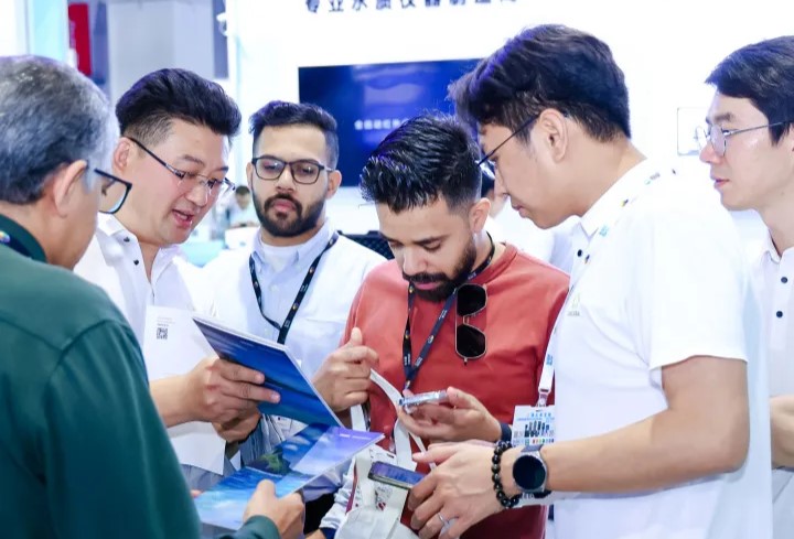 Attendees and exhibitors engaging in discussions at the Shanghai International Environmental Protection Expo 2024, showcasing innovative environmental technologies and products.