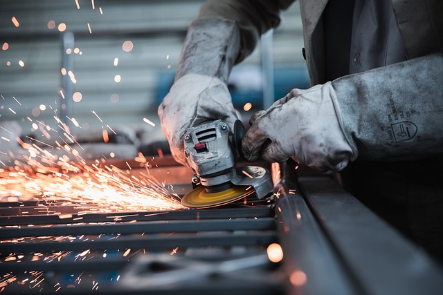 Worker operating machinery in a steel factory, symbolizing China's industrial carbon emissions and the transition to cleaner steel production methods.