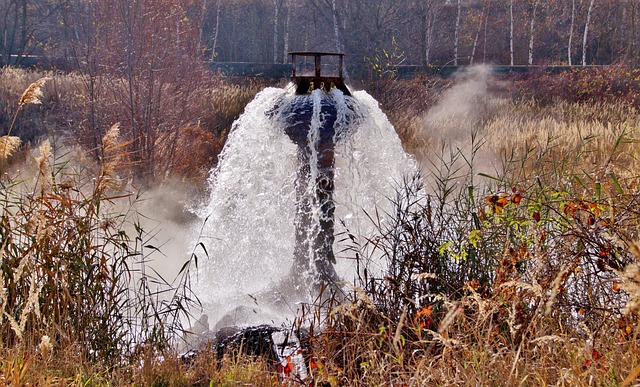 Smart water drainage system in a village, showcasing efficient rainwater and sewage management with modern infrastructure against a rural backdrop.